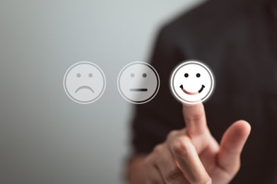 businessman-presses-touch-screen-with-smiling-face-concept-business-service-satisfaction