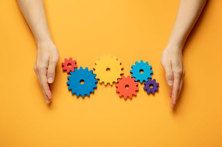 colorful-cogwheels-arrangement-flat-lay