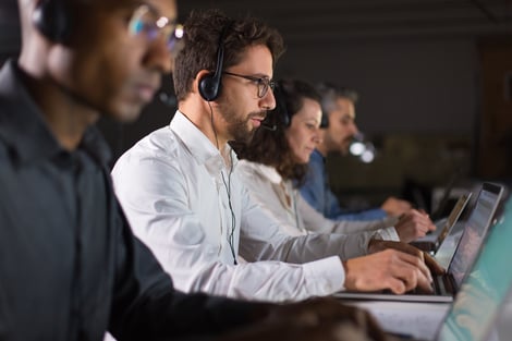confident-call-center-operator-talking-with-client-1